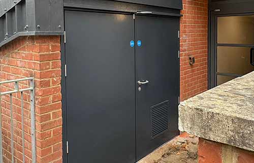 P and F Cladding - doors - bin store - after