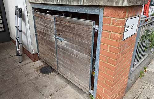 P and F Cladding - doors - gas cupboard - before