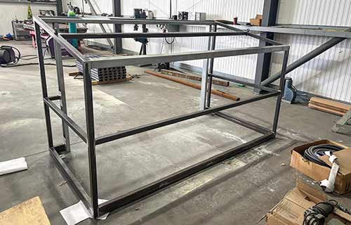 P and F Cladding - doors - designed and creating new bin store - steel frame