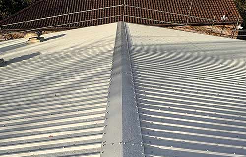 P and F Cladding - Faversham Fire Station - overclad existing roof